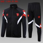 Manchester United 24/25 Black Long Zip Jacket with Red and White Sleeve Accents