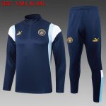 Manchester City 23-24 Half-Zip Jacket in Royal Blue with Gold Logo